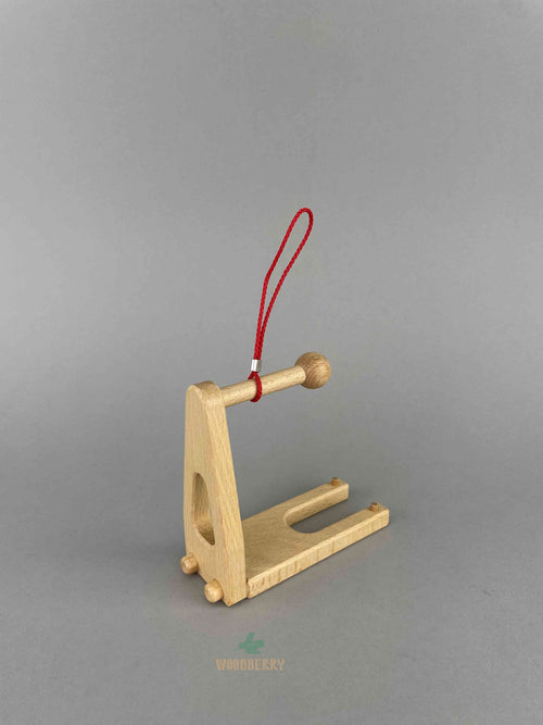 Wooden Fork attachment for the Fagus mobile crane or floor crane. The red rope pointing upward showing stiffness of the string