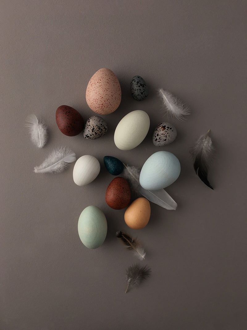 Wooden eggs in a basket for open-ended play