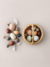 rattan basket with 12 wooden eggs 