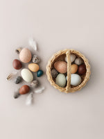rattan basket with 12 wooden eggs 