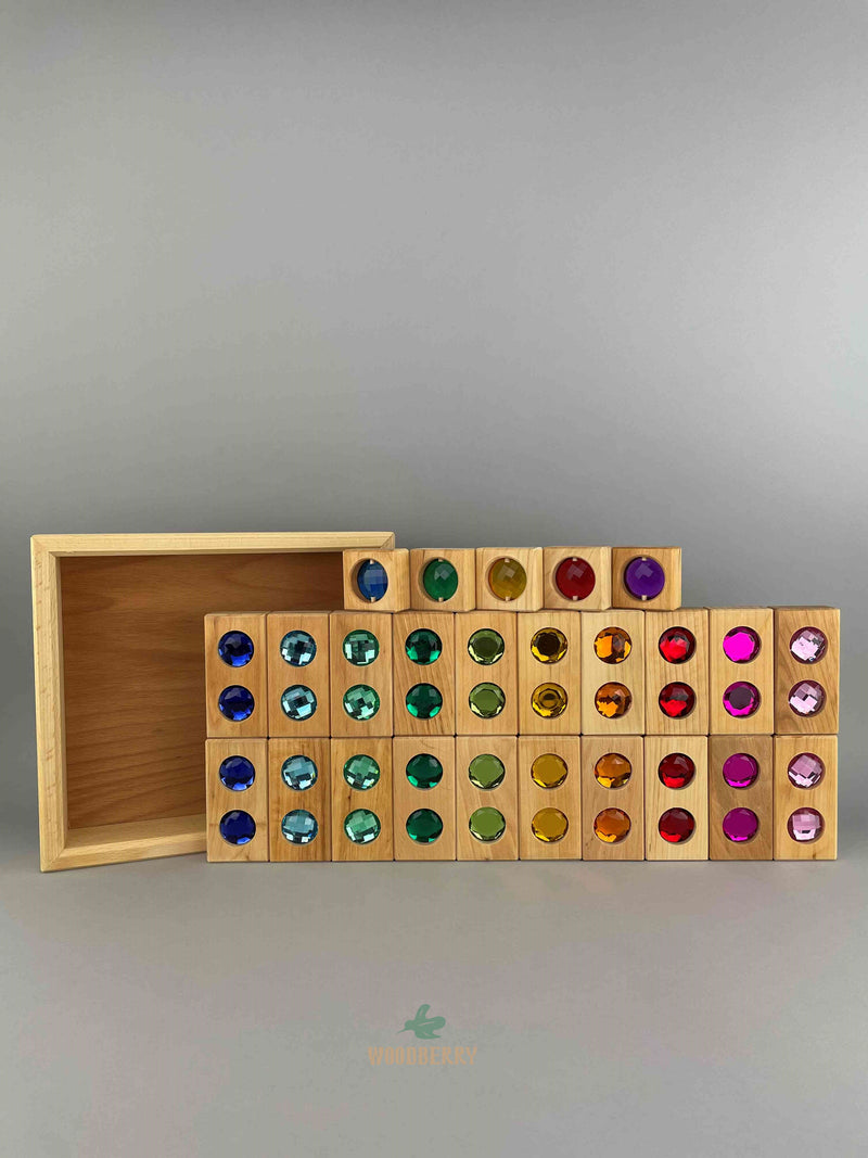 Full image of complete Bauspiel combination set that includes 20 colour street blocks, 5 window blocks and wooden tray standing upright. 