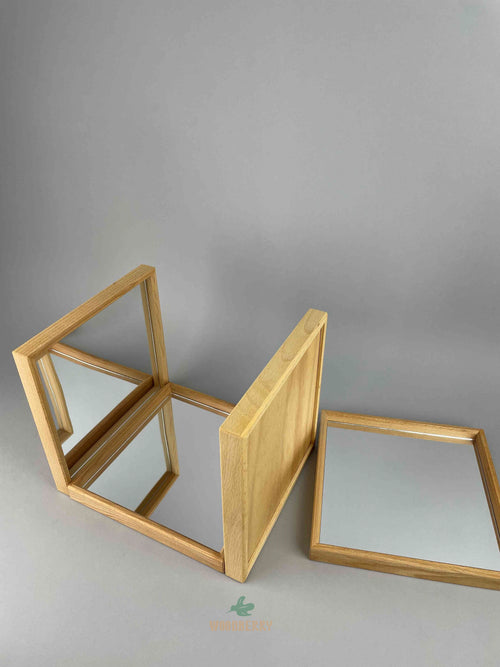 Woodberry Bauspiel Set of 4 Mirror Trays arranged to show different faces