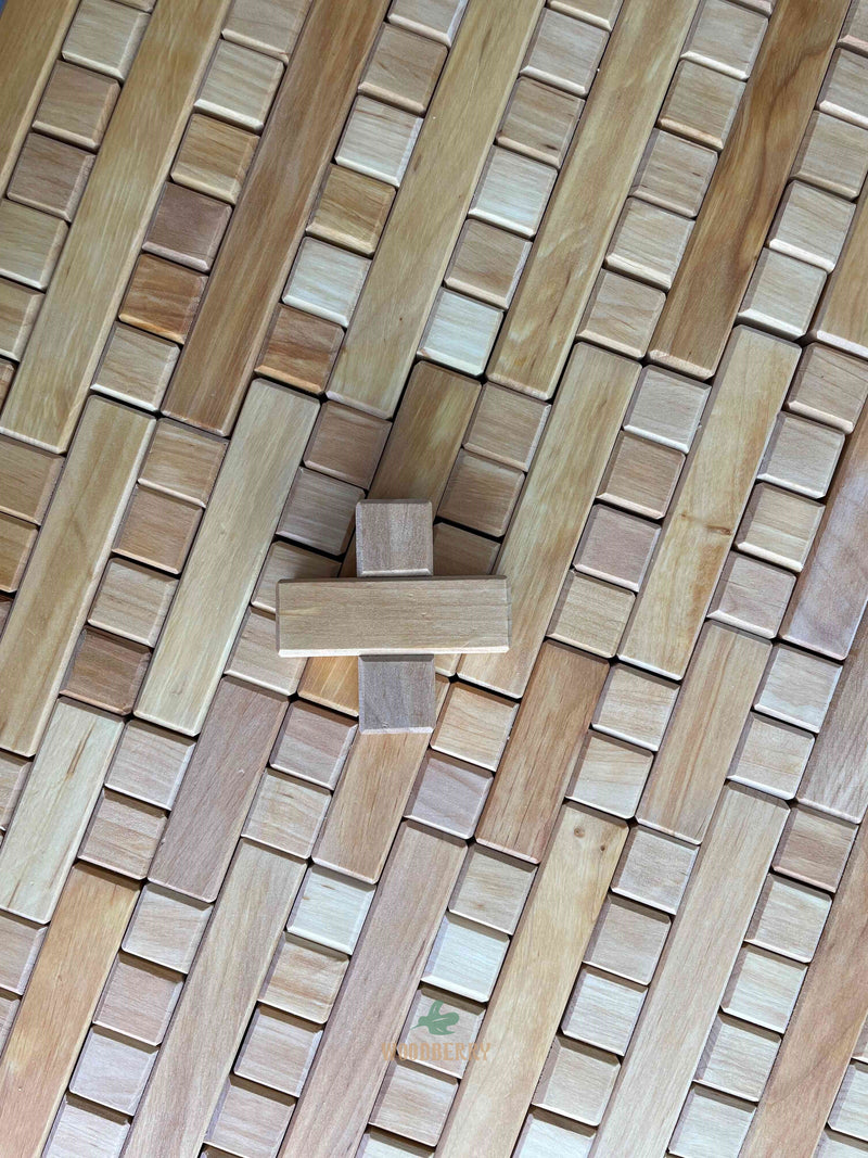 Top-down photo of one Single Plus block from Bauspiel on a bed of plus blocks arranged to form a flat surface. 