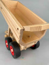 Woodberry Fagus Container Tipper Trailer rear angle view of raised bed and open tailgate. 