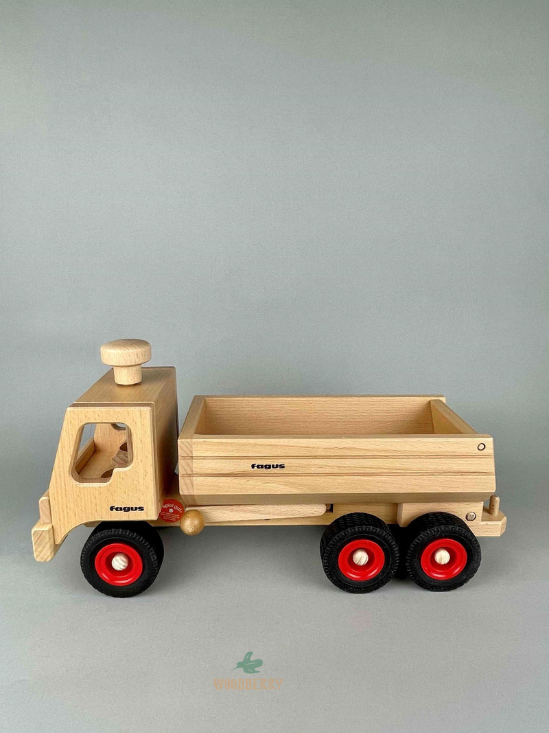 Woodberry Fagus Container Tipper Truck side view of truck with bed lowered. 