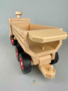 Woodberry Fagus Container Tipper Truck rear angle view with container bed gate open. 