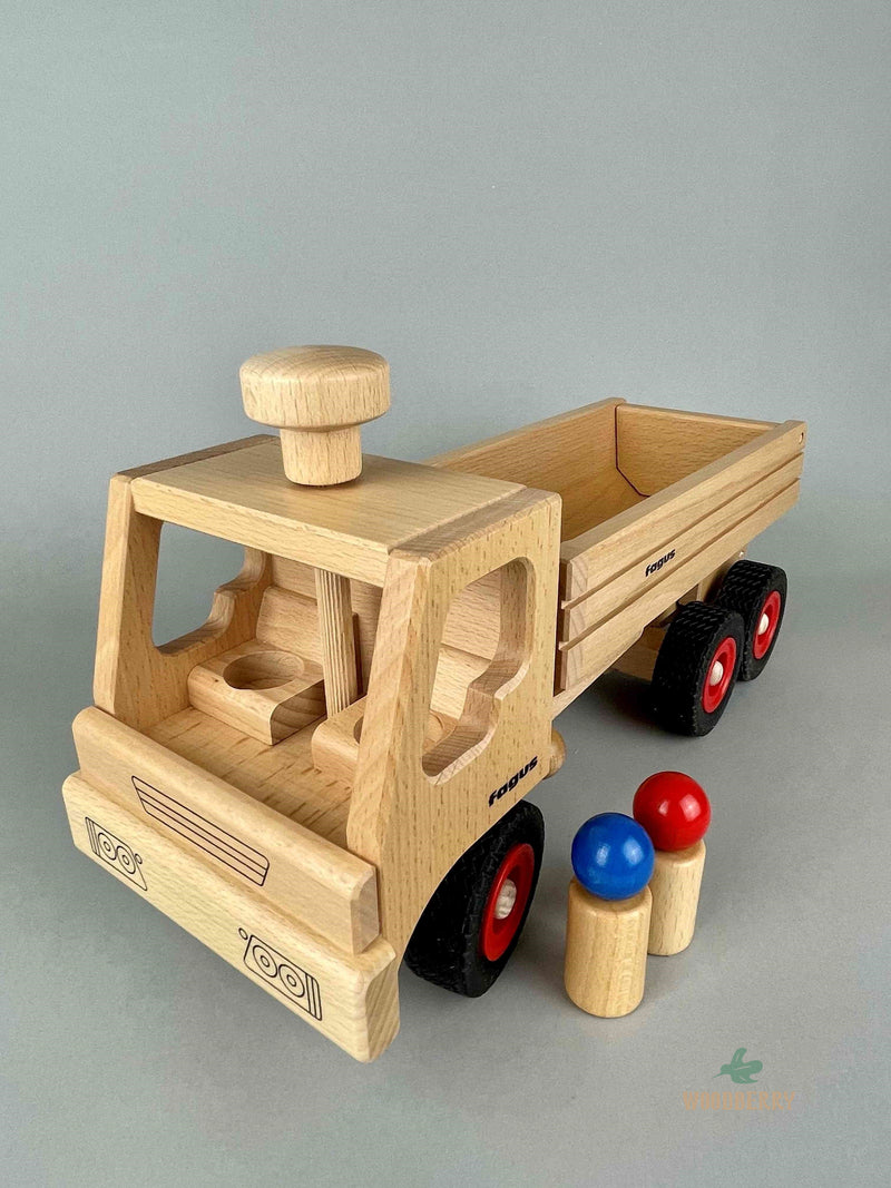 Woodberry Fagus Container Tipper Truck front angle view with two peg people. 