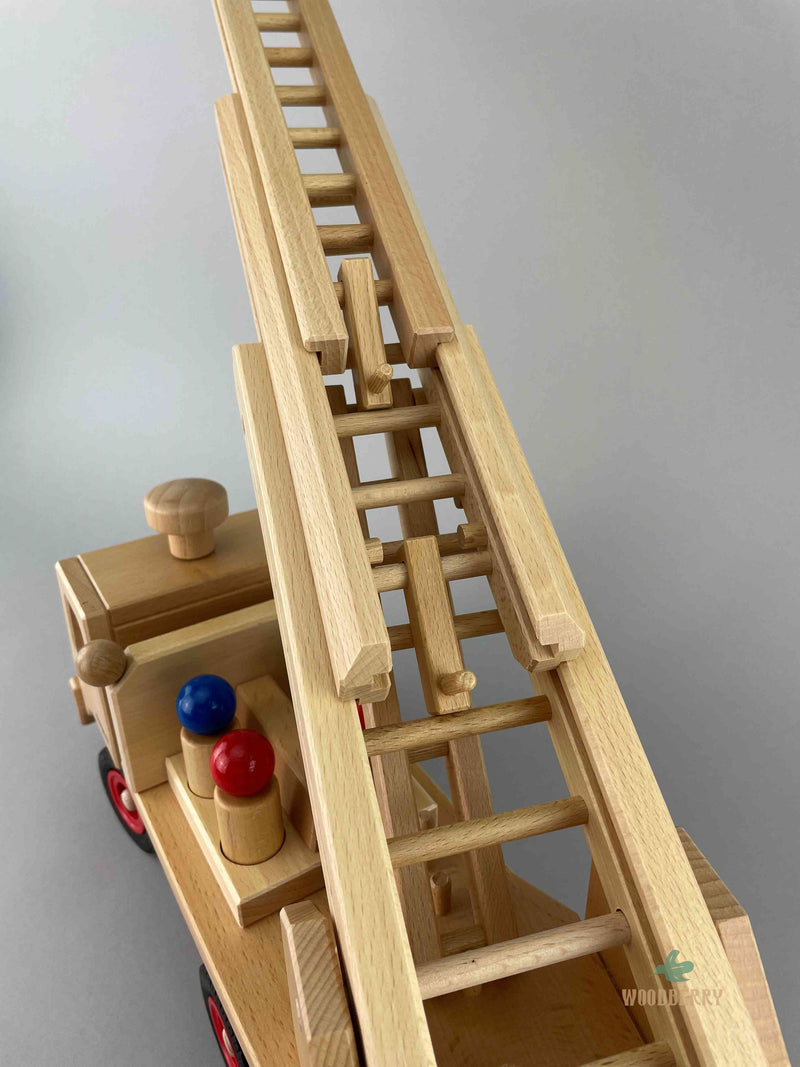 Aerial view. A close-up view of the Ladder of the Fagus truck wooden Fire Engine toy. 