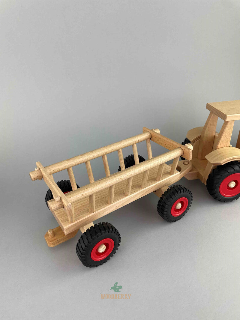 Fagus wooden Hay Wagon is connected with a Modern Tractor. Rear view.