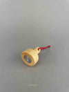 A wooden lifting magnet with red loop hanging rope by Fagus toy. A bottom view with lifting magnet lying on the side to see the magnet part