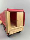 Woodberry Fagus Semi-Truck and Trailer wooden toy rear view image of trailer with one door open to reveal inside of trailer. 