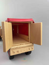 Woodberry Fagus Semi-truck and trailer wooden toy rear view image of trailer with both doors open to show contents of trailer. 