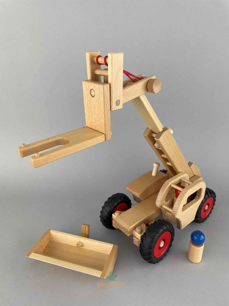 Woodberry Fagus Telescopic Loader with extended boom and jib and fork attachment. Bucket attachment and peg person also shown.