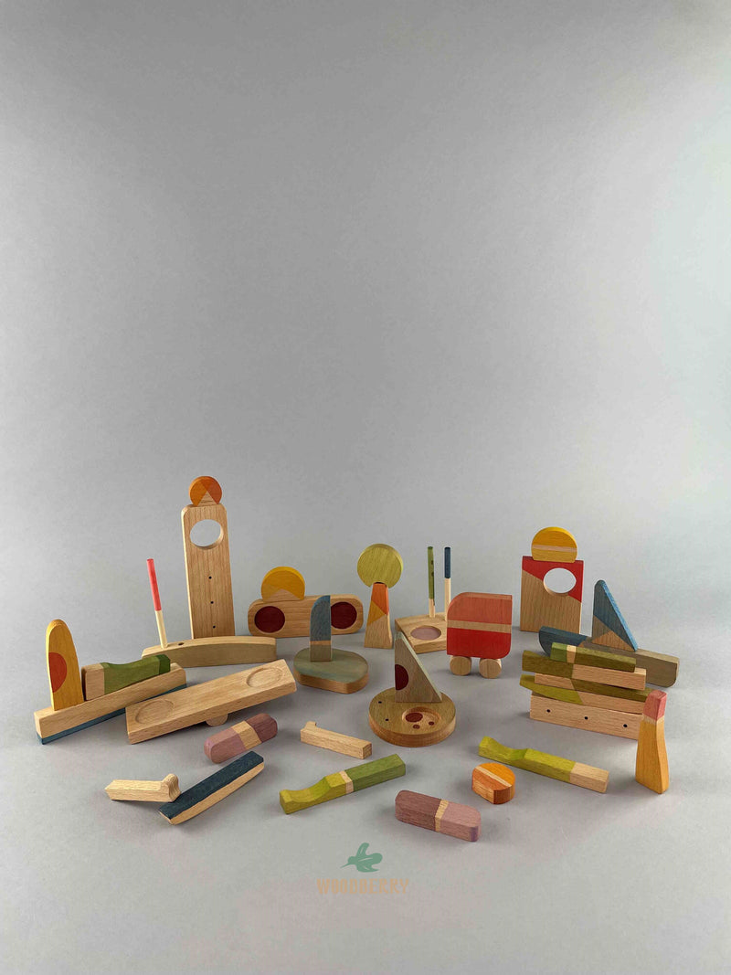 Set of Grapat 2023 Happy Place wooden blocks displayed in miscellaneous shapes.