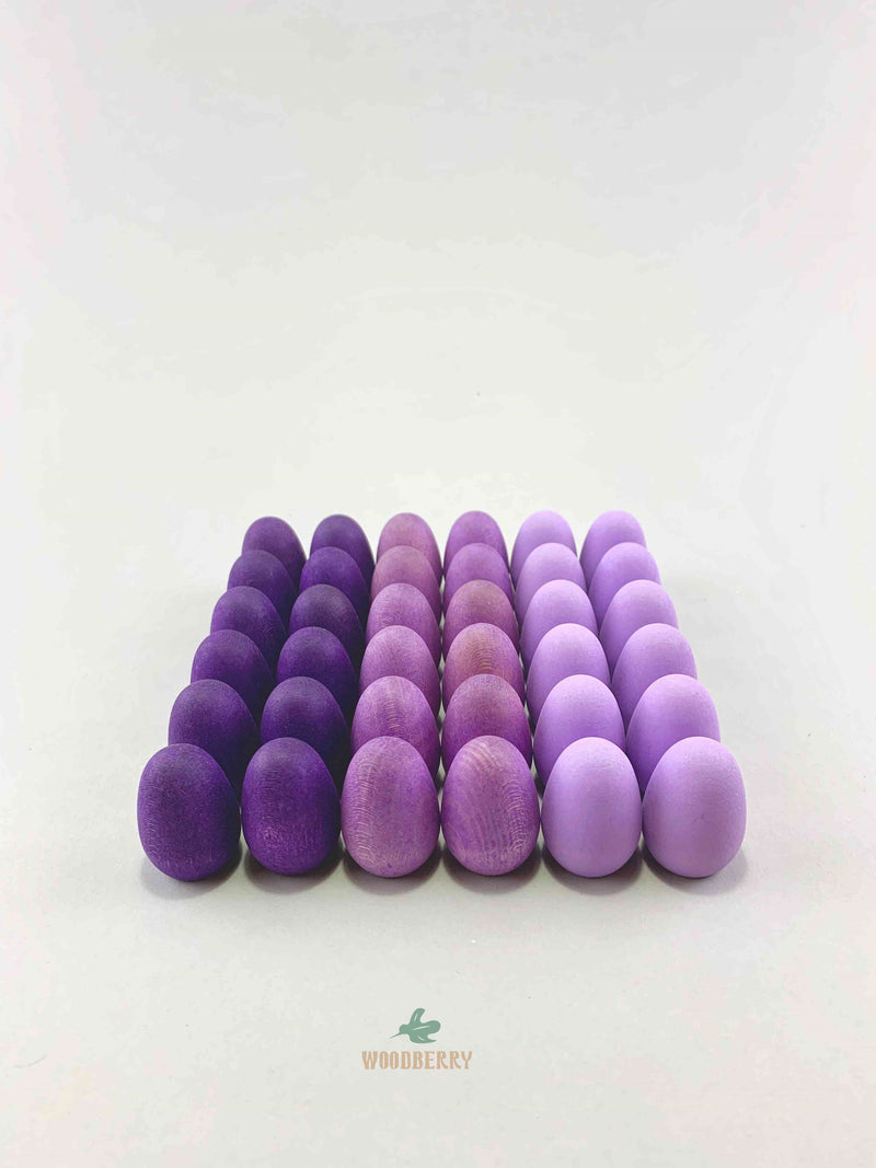 Grapat mandala purple eggs wooden toys displayed in a square shape.