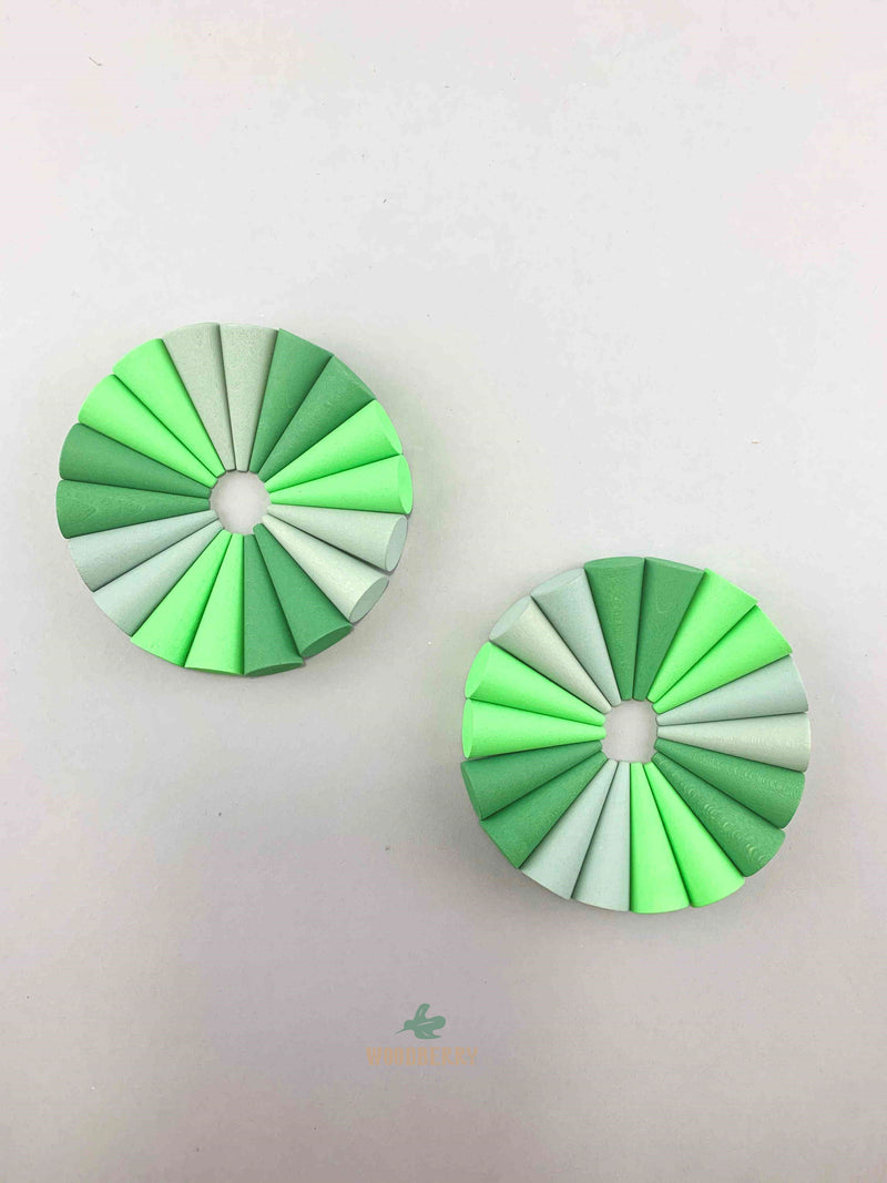 Grapat mandala green cone wooden toys displayed in two circle shapes.
