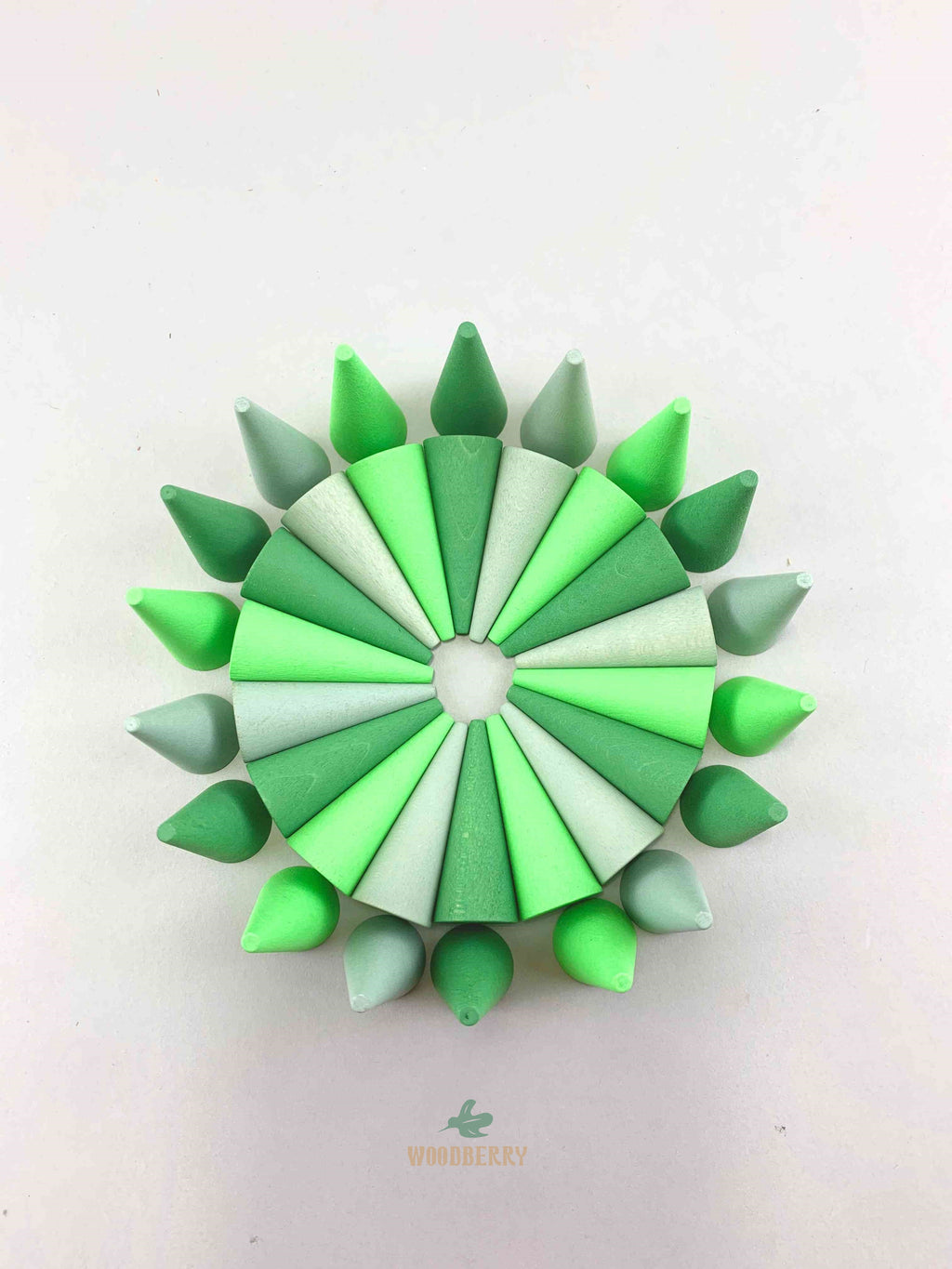 Grapat mandala green cone wooden toys displayed in two circle shapes.