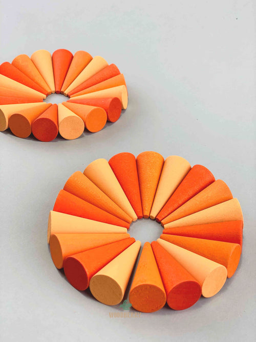 Grapat mandala orange cone wooden toys displayed in a two circular shapes.