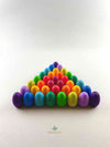 New 2021 Grapat mandala pieces: rainbow eggs. Arranged in a triangle shape, organized symmetrically by color.