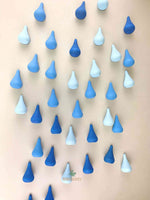 Grapat mandala blue raindrop wooden toys displayed as falling rain.