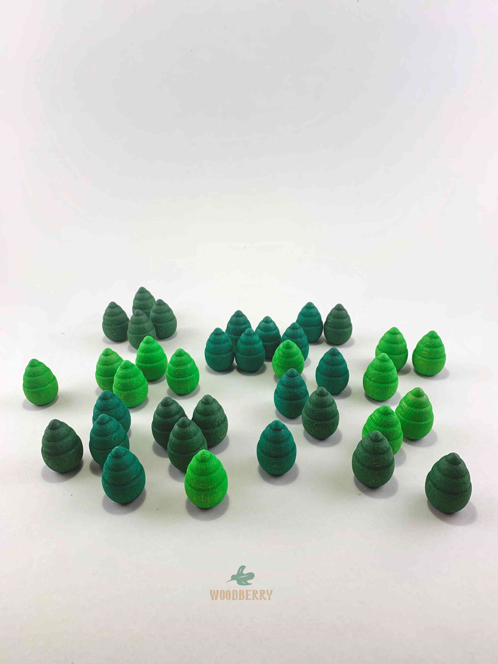 Grapat mandala green tree wooden toys displayed as a forest.