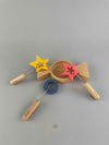 Woodberry Kiko gg wooden candy-shaped bubble dish with two star-shaped wands and one circular wand. 