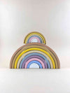 Raduga Grez Wooden Rainbow toy stacker in sand USA