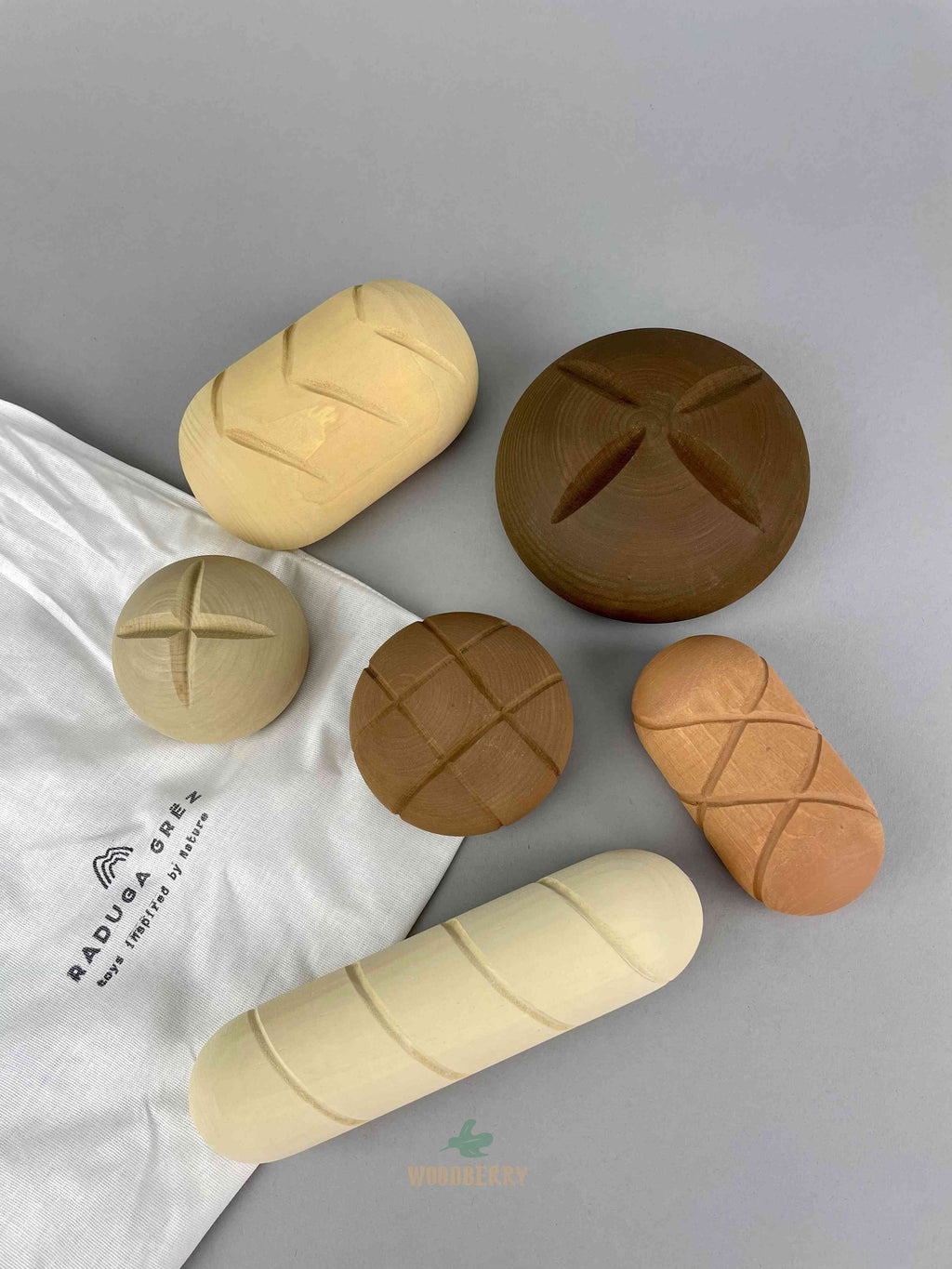 Wooden bread toy handmade by Raduga Grez. 6 pcs top view.
