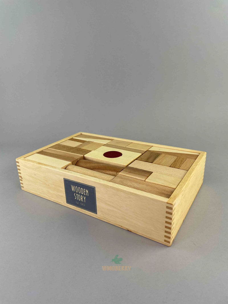 Natural color wooden blocks by Wooden Story 63 pcs all packed in the tray. Photo taken from an angle.  