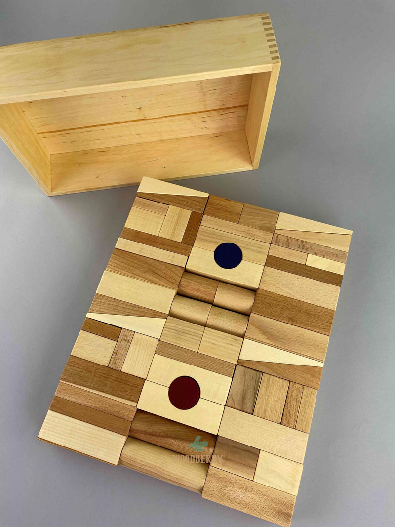Wooden Story XL Wooden blocks arranged in a one-layer rectangle with the storage tray standing on the side