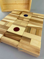 Wooden Toys - natural wooden blocks in a tray made by wooden story. Front, top side angled view. 